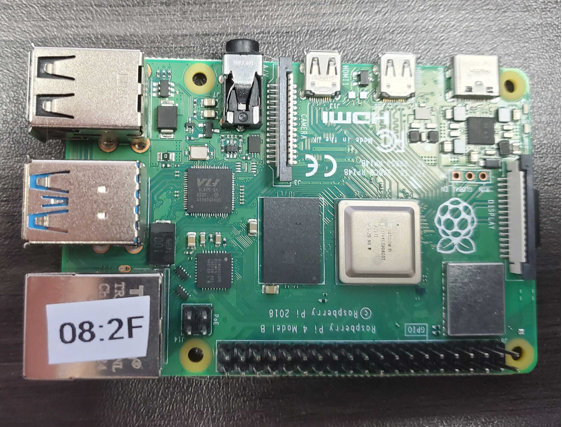 Image displaying an example of a Rasberry Pi and its Wifi name on the ethernet port.